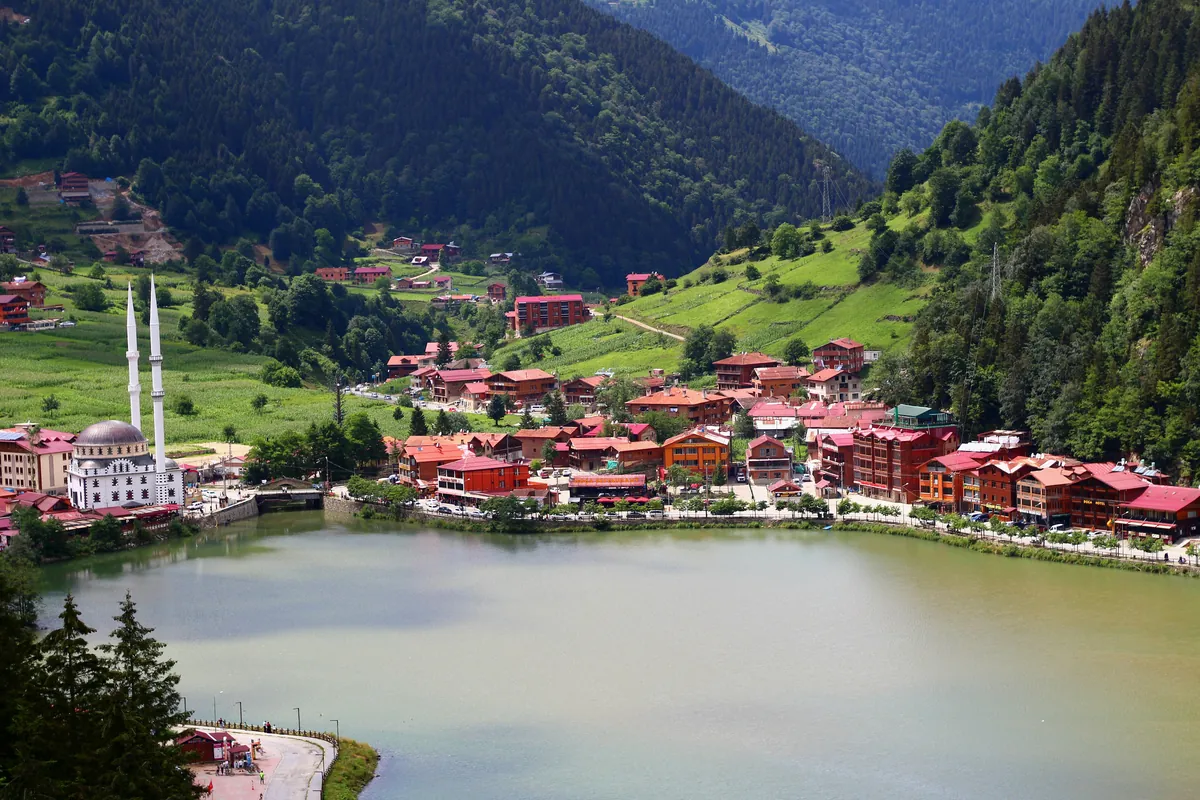 Mosque and wooden hotels on the shore of Uzungöl